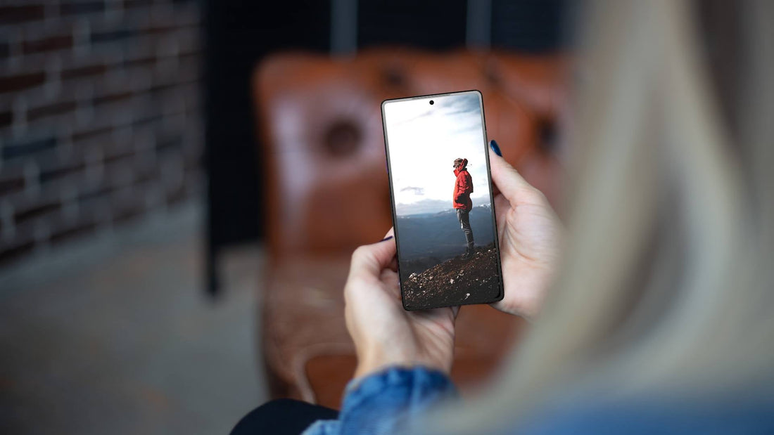 photo of woman's back while holding Samsung Galaxy S25 Ultra